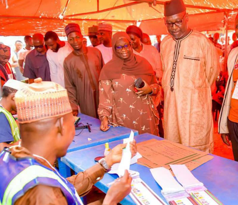 * Gov Abubakar Sani Bello (right) and Wife waiting to cast their votes in Minna.