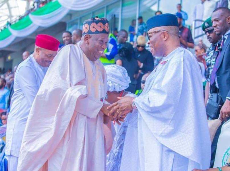  Nigeria's President of Senate, Senator Godswill Akpabio (right) in a congratulatory handshake with APC National Chairman, Dr Abdullahi Ganduje on his 74th birthday.