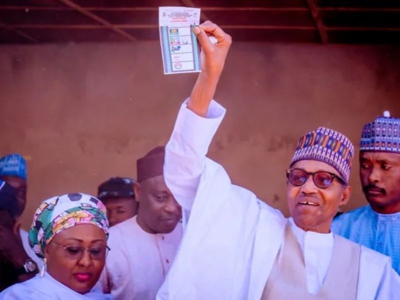 * President Muhammadu Buhari (right) and his wife, Aisha (left), voting on election day in Daura, Katsina State.