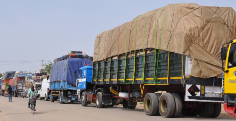 The trucks loaded with food stuffs.