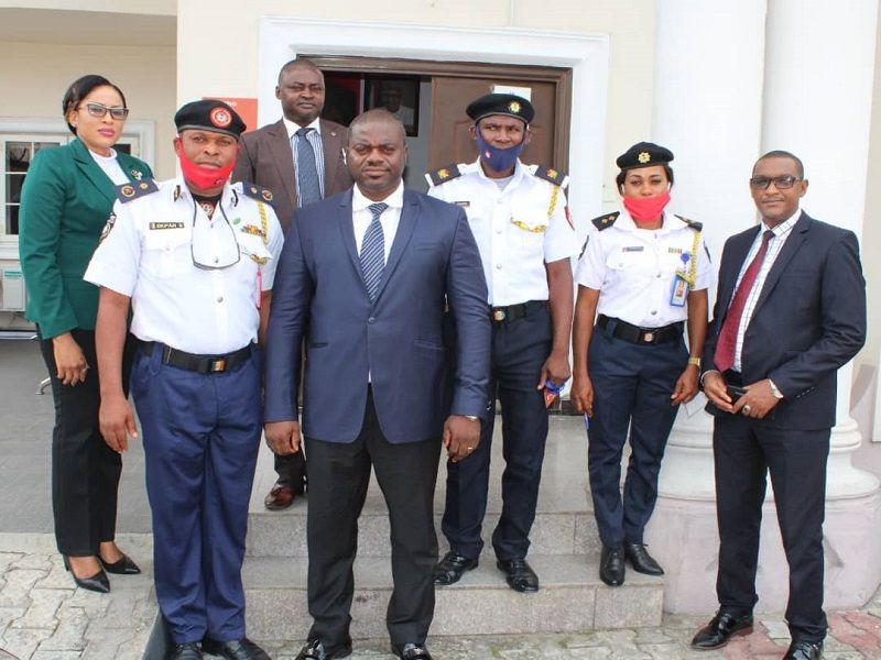 Fire service officials with EFCC officials