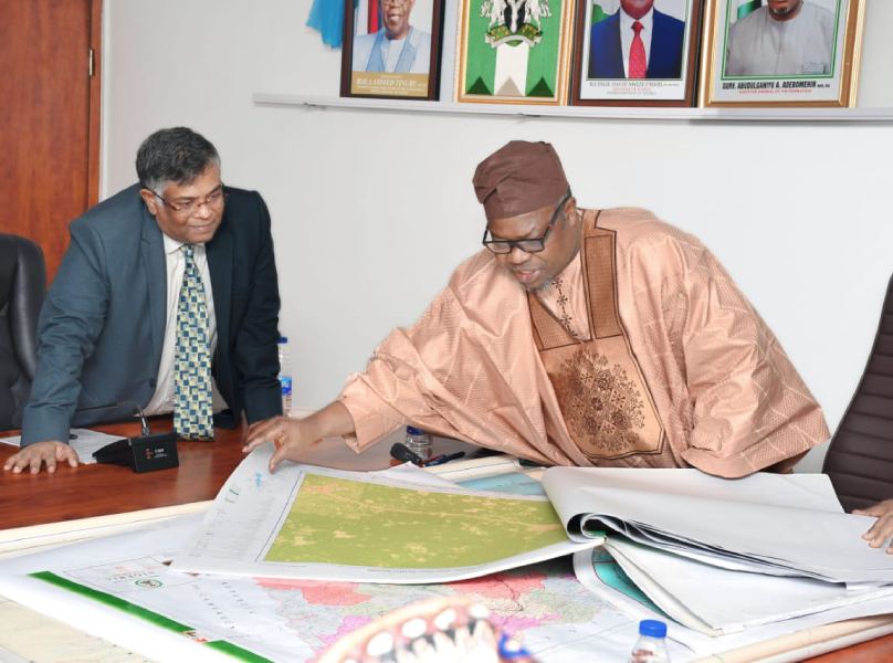 From Right: SGOF, Surv.Abuduganiyu Adebomehin mnis, fce, displaying different soil maps of the country, to the Indian High Commissioner to Nigeria, Ambassador Shri G.balasubramanian who visited OSGOF for collaboration between India and Nigeria on mapping.