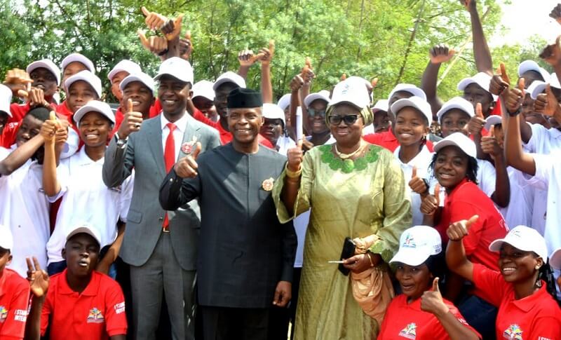 *  Prof Yemi Osinbajo (m), EFCC Chairman, Abdulrasheed Bawa (L) and the Model Senior Secondary School, Maitama, Abuja principal, Mrs Omolayo Omayoza and others in a group photograph.
