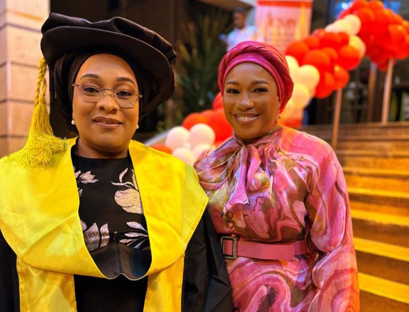  Mrs Okadigbo and a friend.