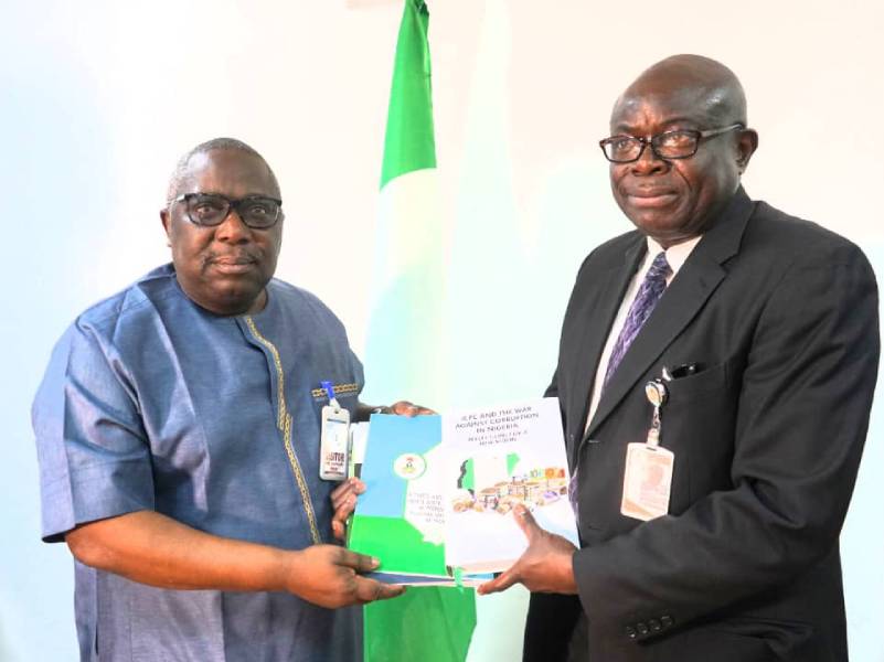 ICPC Secretary, Mr Clifford Okwudiri Oparaodu Esq on behalf of the Commission's Chairman, Dr Musa Adamu Aliyu SAN,.presenting some of the Commission 's publications to Dr Dapo Olorunyomi, tha CEO of Center for Journalism and Innovative Development, during a familiarization visit to the ICPC Headquarters in Abuja.