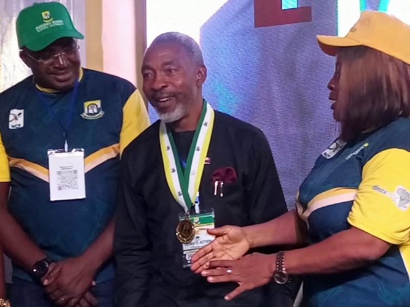 Dr Ike Neliaku, NIPR President being honoured by the University 