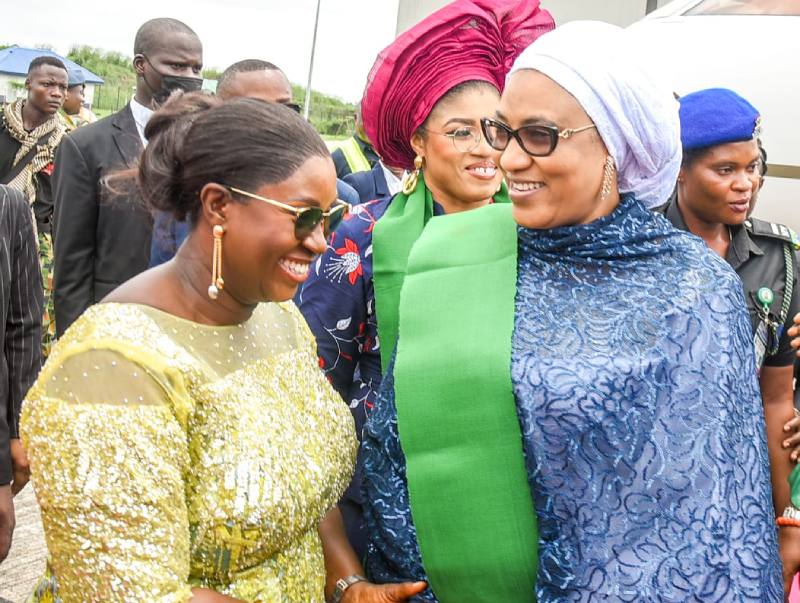 Wife of Rivers State Governor, Lady Valerie Siminalayi Fubara (left); exchanging pleasantries with representative of Nigeria's First Lady and wife of Vice President, Hajia Nana Kashim Shettima (right); during the official launch of Renewed Hope Initiative Women Agricultural Support Programme for South-South zone in Uyo, Akwa Ibom State, on Tuesday.