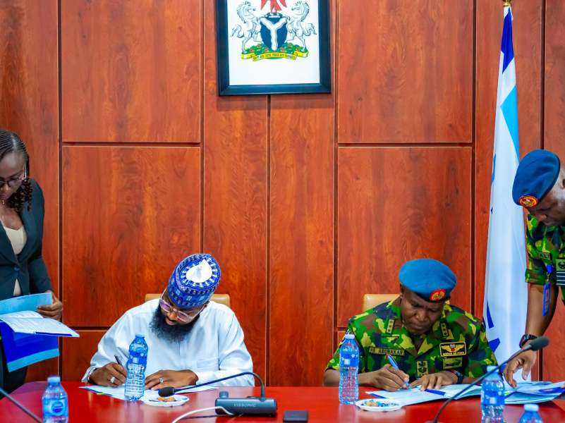 L-R: Executive Vice Chairman/CEO, National Agency for Science and Engineering Infrastructure (NASENI), Mr. Khalil Suleiman Halilu and Chief of Air Staff, Nigerian Air Force, Air Marshal Hasan Bala Abubakar signing an memorandum of understanding (MoU) to renew partnership to drive Indigenous defense technologies development at the Agency’s headquarters in Abuja on Friday, July 25, 2025.  