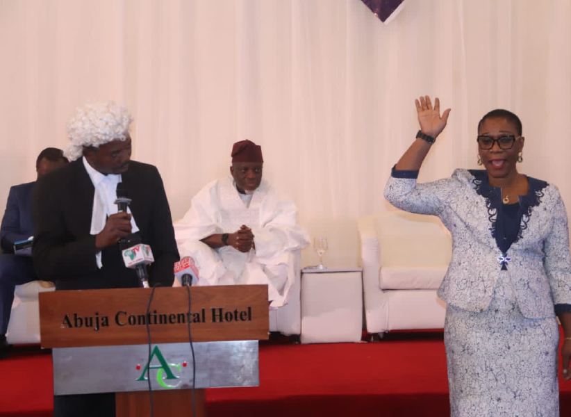 Re-elected GOCOP President, Maureen Chigbo, taking oath for the second term.