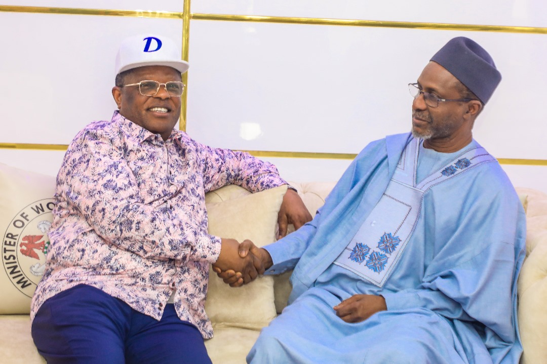  Engr. David Nweze Umahi, Minister of Works (left) and Hon. Balarabe Abbas Lawal, Minister of Environment (right) during their meeting at Umahi's Office on Wednesday.