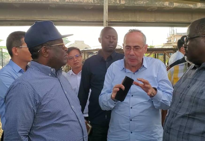 Nigeria's Minister of Works, Engr Dave Umahi (left) with road construction Engineers and officials of his Ministry.