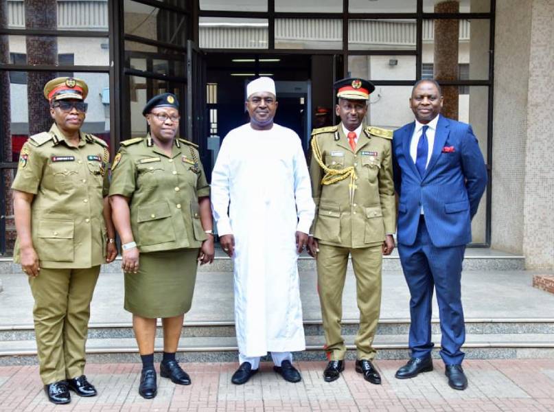 *  NDLEA Chairman, Brig-Gen Mohammed Buba Marwa (middle) with some of his newly promoted Narcotics Agency Officers.