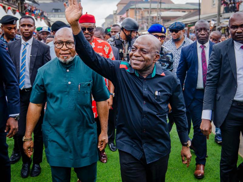 Governor Otti acknowledges cheers as he arrives the venue of the commissioning.