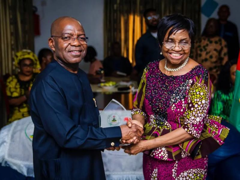 NAFDAC Director General, Professor Mojisola Adeyeye (right) presents a souvenir to Abia State Governor, Dr Alex Otti.