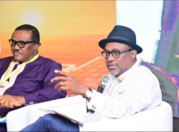 *  Engr. Simbi Kesiye Wabote (right) issuing warning on Petroleum Industry Act.