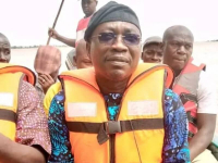 *  Hon Kwamoti Laori on a boat during the assessment of the flooded areas in Adamawa.