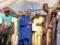 *  NNPP's big catch, Baba Sabulu (in yellow) being welcomed by it's Governorship candidate, Ahmed Mailantarki (in blue) and the party Chairman, Abdullahi Maikano (in brown) in Billiri.