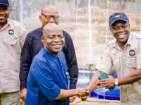 Governor Alex Otti (left) in warm handshake with Comrade Okoro. They are observed by Comrade Godson Anucha, Senior Special Assistant to the Governor on Labour Relations.